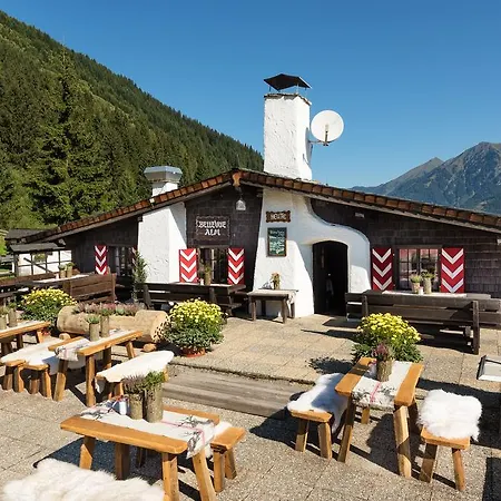 בית הארחה Mondi Bellevue Alm Gastein באד גסטיין